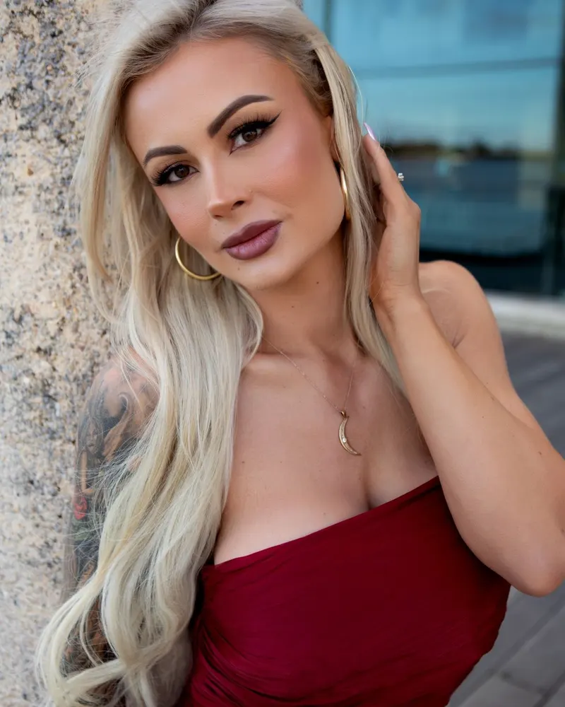 Monique Lester, Australian model and founder of Crystal Rose Intimates, in a red gown